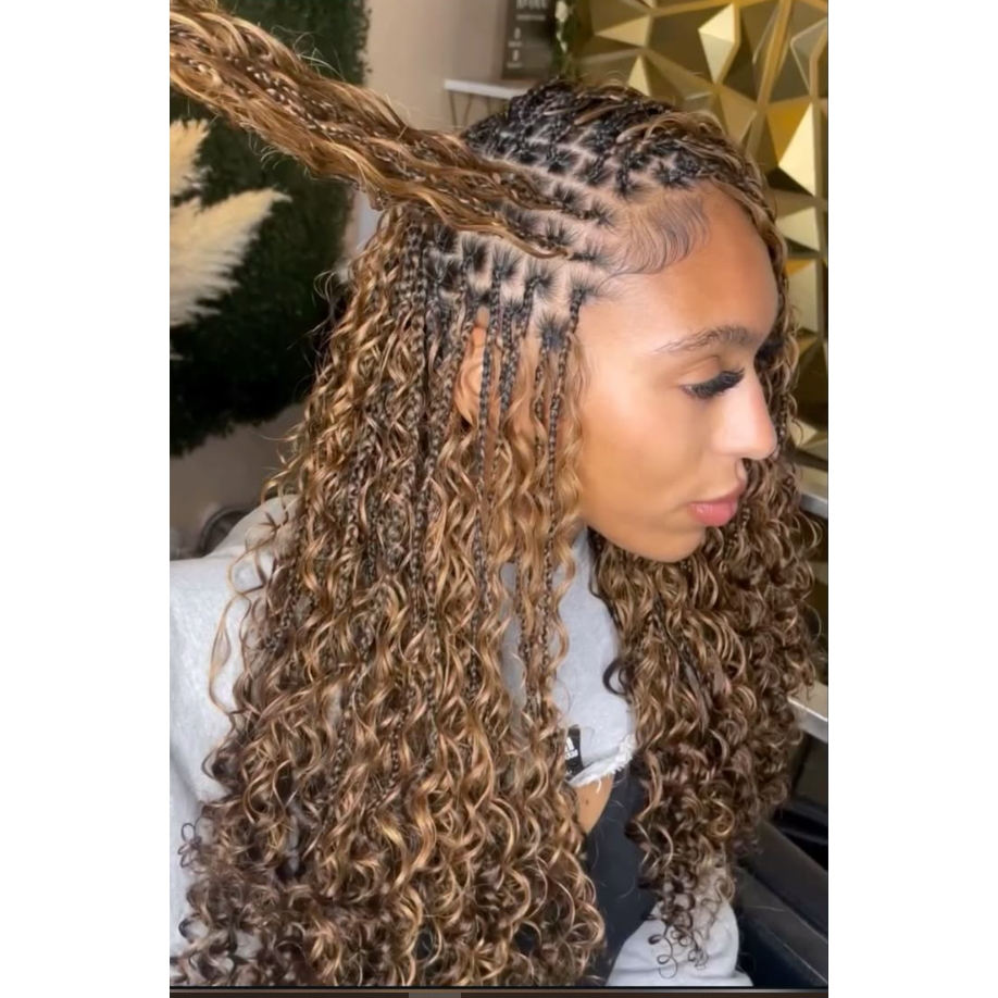 Person with styled hair in a salon setting